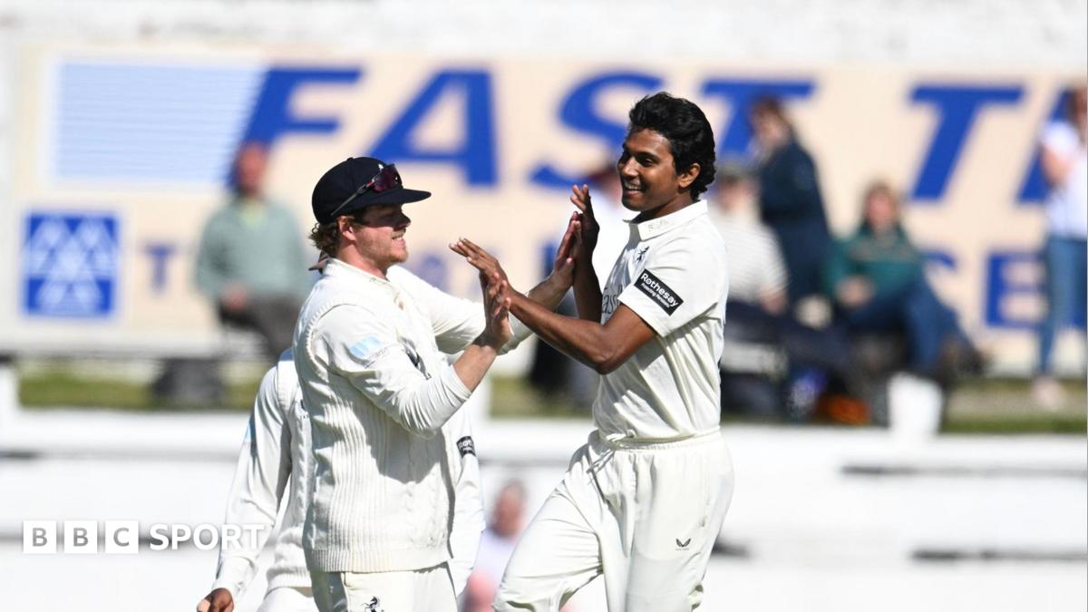 Hasan Mahmud (right) is congratulated by Sam Northeast (left) after taking a Lancashire wicket at Blackpool
