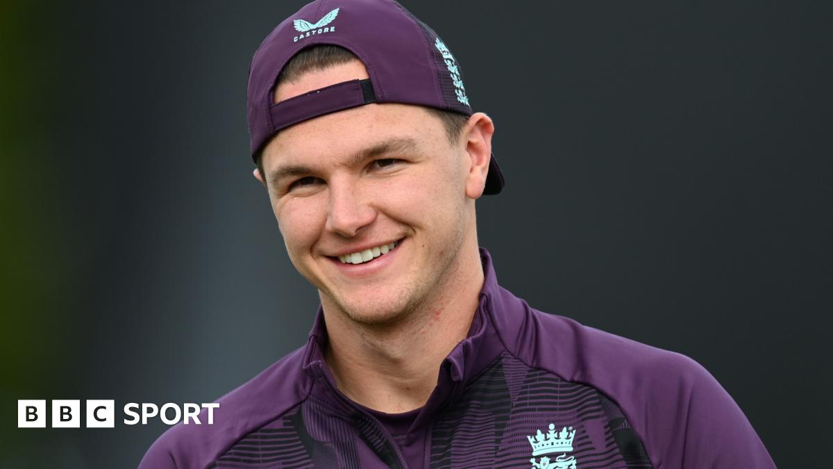 Sonny Baker, wearing a cap, smiles during England training